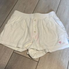 Nwt Stoney Clover Lane White Terry Cloth Shorts Size Small. Open To Reasonable Offers And Cross Posted On M. Low Offers From Resellers Will Be Declined. White Bottoms With Built-in Shorts, Cute White High Waist Bottoms, White Cotton Bottoms With Built-in Shorts, White Bottoms For Beach Season Loungewear, Casual White Pajama Shorts With Elastic Waistband, White Cotton Shorts For Loungewear, Cute High Waist White Shorts, White Casual Beach Shorts, Casual White Beach Shorts