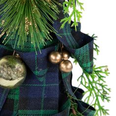 Blue and green plaid ribbon bow Christmas cone tree. Mini gold and blue ornaments. Green foliage peaks out the ribbons Blue Ornaments, C9 Christmas Lights, Pre Lit Wreath, Christmas Cones, Cone Trees, Cone Christmas Trees, Ribbon Christmas, Plaid Christmas Tree, Christmas Tabletop