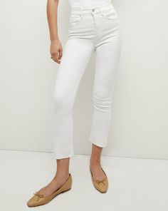 Our best-selling Carly kick-flare jean has been updated to a non-stretch denim, giving it a classic and timeless style. Wear this effortlessly cool jean with everything from tees to blouses.78% Cotton, 14% Reused Cotton, 6% Recycled Polyester, 2% ElastaneTurn inside out and machine wash cold. Hang to dry.Style #J22121510276WH Classic White Fitted Flare Jeans, Classic Cropped Flare Jeans With Frayed Hem, Classic White Denim Flare Jeans, Classic Flare Jeans For Spring, Classic Flare Jeans With Frayed Hem, Classic Spring Cropped Jeans With Frayed Hem, Classic White Mid-rise Cropped Jeans, Classic Cropped Jeans With Frayed Hem For Spring, White Flare Jeans For Fall