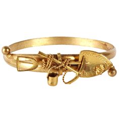 Unusual Victorian bangle commemorating the South African Gold Industry. Crossover style with mining motifs. Large size. 1890's. Excellent condition Luxury Victorian Bangle For Anniversary, Luxury Victorian Style Bangle Jewelry, African Gold, South African, The South, Bangle Bracelet, Rose Gold Ring, Costume Jewelry, Crossover