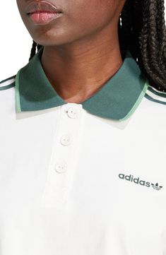 Add a sporty element to your street style with this cropped cotton polo featuring logo embroidery and 3-Stripes detailing on the sleeves. Button half placket Spread collar Short sleeves 100% cotton Machine wash, dry flat Imported Cloud White, Cotton Polo, Logo Embroidery, Embroidery Logo, Adidas Originals, Short Sleeves, Nordstrom, Stripes, Street Style