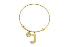 This bracelet makes for a great gift for anyone, including yourself! Wear your initial or stack a bunch and wear your name, your kid's initials, the word "love" - the sky is the limit! Each letter measures about 3/4 inch wide. Each letter is complimented with a textured, flat disc charm measuring about 1/2 inch. Bracelet is expandable to fit any size. Bracelet is crafted in gold-plated brass and fits a 7-8 inch wrist. - Lifetime Guarantee - 60 Day Worry-Free Return - "J" Initial Expandable Wire Initial Bracelet J, Initial Bracelets, J Initial, Wire Bangle Bracelets, The Sky Is The Limit, Sky Is The Limit, Word Love, Wire Bangles, Womens Jewelry