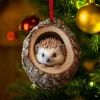 an ornament shaped like a hedgehog in a christmas tree with ornaments around it