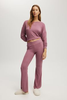 SUPER SOFT RELAXED FLARE PANT Relaxed Fit Wide Leg Leggings For Loungewear, Wide Leg Relaxed Fit Leggings For Loungewear, Purple Relaxed Fit Bottoms, Purple Relaxed Fit Full Length Bottoms, Purple Full Length Relaxed Fit Bottoms, Relaxed Fit Mid-rise Loungewear Bottoms, Pink Athleisure Pants For Lounging, Mid-rise Relaxed Fit Pants For Loungewear, Solid Color Mid-rise Loungewear Pants