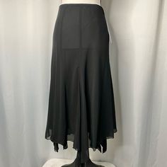 Sharon Max Black Skirt, Sheer, Pull On, Elastic Waist Band, Asymmetrical Bottom, Layered Mesh Look, Lightweight Black Sheer Skirt, Black Pleated Mini Skirt, Pale Pink Dress, Floral Print Maxi Skirt, Black Overlay, Grey Mini Skirt, Business Skirt, Chiffon Maxi Skirt, Urban Outfitters Skirt