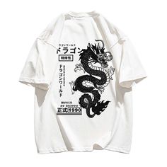 Introducing our Dragon T-Shirt, a symbol of strength and power. Crafted with high-quality materials, this shirt exudes luxury and sophistication. Its sleek design and intricate dragon motif will leave a lasting impression. Elevate your style with this exclusive piece and make a powerful statement wherever you go. Features: -100% Cotton -Crew Neckline -Dropped Shoulder -Regular fit -Unisex style Cotton T-shirt With Dragon Print, Black Crew Neck T-shirt With Dragon Print, Short Sleeve Tops With Dragon Print For Streetwear, Casual Dragon Design Tops For Streetwear, Cotton T-shirt With Dragon Print Short Sleeve, Dragon Print Cotton T-shirt For Streetwear, Cotton T-shirt With Dragon Print For Streetwear, Casual Crew Neck T-shirt With Dragon Print, Cotton Crew Neck T-shirt With Dragon Print