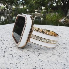 Product Description: ✨ GlamorLink Crystal Metal Apple Watch Band ✨ Elevate your Apple Watch with our GlamorLink Crystal Metal Band, designed to add a touch of elegance and sparkle to your wrist. This premium stainless steel band is adorned with shimmering crystals, making it the perfect accessory for any occasion--whether it's a night out or a casual day at work. 💎 Features: *Sparkling Crystals: Beautifully embedded crystals that catch the light from every angle. *High-Quality Material: Made fr Luxury White Apple Watch Band With Bracelet Strap, Luxury White Adjustable Apple Watch Band, Luxury Adjustable White Apple Watch Band, White Rectangular Watch Accessories For Gifts, Rectangular White Watch Accessories For Gift, Rectangular White Watch Accessories As Gift, Luxury White Adjustable Watch Bands, Luxury Adjustable White Watch Bands, Luxury White Rectangular Watch Bands