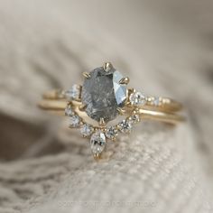 a close up of a ring with a stone