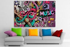 a living room with a couch and painting on the wall above it that says music