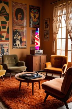 a living room filled with furniture and pictures on the wall