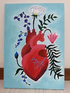 a painting of a heart and flowers on a blue background