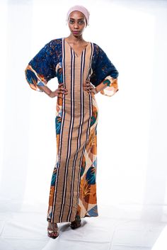 DESIGNER'S NOTE: Cotton Kaftan Maxi Dress. Envelope yourself in comfortable elegance wearing this floor-skimming kaftan that artfully fuses 3 different fabrics to stunning effect. The mixed print cotton used for the kaftan is beautifully complemented by dramatic lace sleeves and the striped brown and navy striped cotton used in the middle. Designed to flatter your curves. Comfy chic. And it has pockets!CUSTOM MADE: Designed especially for you to ensure a perfect fit according to your height and Multicolor Printed Maxi Kaftan, Multicolor Maxi Kaftan With Printed Motifs, Batik Print Maxi Length Kaftan, Multicolor Long Sleeve Block Print Kaftan, Multicolor Block Print Kaftan With Kimono Sleeves, Multicolor Maxi Length Batik Print Kaftan, Multicolor Batik Print Maxi Kaftan, Plus Size Resort Wear, Bohemian Maternity