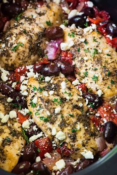 chicken with olives, tomatoes and feta cheese in a slow cooker