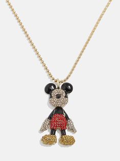 a necklace with a mickey mouse charm hanging from it's center, on a gold chain