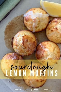 some lemon muffins are sitting on a plate