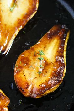 some food is cooking in a pan on the stove top and ready to be cooked