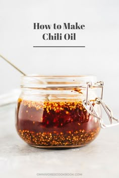 how to make chili oil in a jar with text overlay that reads, how to make chili oil