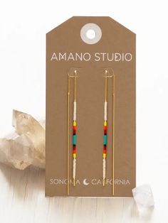 These swishy, sexy and stunning ear thread earrings by Amano combine their best-selling threaders with their best-selling Miyuki seed bead earrings. Great for summer, and elegant enough for a dressy night out. Simply thread in and go! Made with genuine Japanese Miyuki beads in a variety of color combinations and 14k gold plated brass. Choose from the following colorways: Champagne: A neutral mix of rose gold, gold and copper beads Chocolate: A rich blend of neutral brown, gold and black earth to Minimalist Seed Bead Earrings, Polymer Clay And Seed Bead Earrings, Ear Thread Earrings, Seed Bead Earrings Ideas, Seed Bead Color Combinations, Seed Bead Earring Patterns, Seed Bead Earrings Diy, Beaded Christmas Earrings, Free Jewelry Making Projects