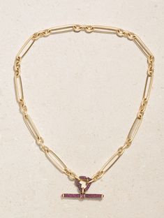 Victorian jewellery serves as a huge source of inspiration for Lucy Delius - her signature multi-size pavé setting pays homage to techniques from the era. Crafted from 14-karat recycled gold, this necklace is strung with a rhodium-plated T-bar pendant and a playful heart-shaped 'Love Connection' clasp, each dusted with vivid rubies. The elongated 'Trombone' links are inspired by historic pocket watches. Elegant Gold Plated Open Heart Charm Necklace, Elegant Gold Open Heart Charm Necklace, Gold Heart Charm Lariat Necklace, Ruby Heart Charm Necklace, Trombone Necklace, Gold Ruby Necklace, Victorian Jewellery, Love Connection, Ruby Necklace