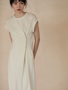 A dress with a unique silhouette that has buttons at the waist and the fabric is gathered together. The design looks like the sleeves are rolled up and folded back. A casual item that can be worn on vacation. 
 
 
 
 
 
 
 
 
 
 
 
 
 
 
 
 Size 
 
 
 S size 
 
 
 Length: 105.5cm 
 Bust: 104cm 
 Sleeve length: 16cm 
 
 M size 
 
 Length: 107cm 
 Bust: 108cm 
 Sleeve length: 16.5cm 
 
 L size 
 
 Length: 108.5cm 
 Bust: 112cm 
 Sleeve length: 17cm 
 
 XL size 
 
 Length: 110cm 
 Bust: 116cm 
 Sle Fitted Button Back Midi Dress For Daywear, Fitted Midi Dress With Button Back For Daywear, Chic Short Sleeve Dress With Button Back, Chic Short Sleeve Button Back Dress, Daywear Midi Dress With Button Back, Button Back Midi Dress For Daywear, Casual Dresses With Pleated Sleeves For Day Out, Summer Cap Sleeve Dress For Workwear, Summer Workwear Dress With Cap Sleeves