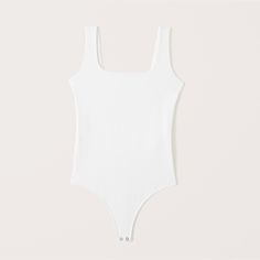 Slim-fitting bodysuit in our new softAF double-layered cotton seamless fabric with wide straps and two-snap bottom closure. Tank Bodysuit, Rib Fabric, Ribbed Texture, Wide Straps, Ribbed Fabric, Women's Tops, Abercrombie Fitch, Womens Tops, Texture