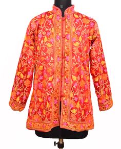 "Item Description From India Kashmiri , this traditional wool jacket heavily embroidered in crewel stitches. Background is ivory with rust and light brown crewel embroidery in traditional Kashmiri floral motif. This is an unusual color scheme for a Kashmiri wool jacket because all the colors are in the same fall palette, resulting in a very classy ombre effect. Measurements: Size Type: Regular Size (Women's): L Decade:1997s Jackets Two Pocket Jackets Bust/Chest Size - \"42\" Inches Jackets Lengt Red Folk Style Spring Outerwear, Red Floral Embroidered Outerwear, Red Festive Nehru Jacket For Winter, Red Nehru Jacket For Festive Winter Occasions, Winter Festive Red Nehru Jacket, Festive Winter Red Nehru Jacket, Red Embroidered Folk Outerwear, Red Folk Embroidered Outerwear, Traditional Red Outerwear With Floral Embroidery