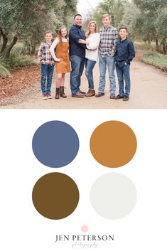 the family is posing for a photo in an olive grove