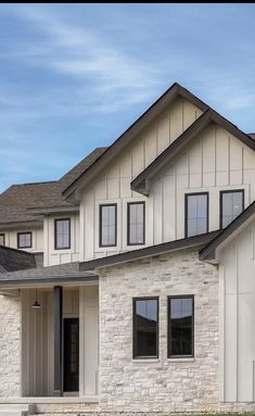 a large white house with two story windows