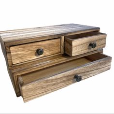 a wooden dresser with two drawers and one drawer open