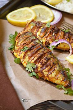 grilled fish with onions, lemons and cilantro