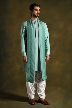 Topaz green kurta adorned with intricate diagonal placed floral embroidery on front and back and floral buttis on sleeves. Comes with white salwar and dupatta. - Aza Fashions White Salwar, Salwar Pattern, Embroidered Silk, Cotton Silk, Aza Fashion, Floral Embroidery, Topaz, Types Of Sleeves, For Men