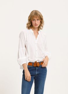 Designed after a Queen, the BOLEYN SHIRT is our take on the exemplary peasant style blouse. This style features a distinctive sleeve detail and gathered look at the cuff for a regal feel. Completed with shell-style buttons and a relaxed fit around the waist for a polished look with an easy, effortless fit. (Rope belt sold separately). Hand or machine wash. Flat or line dry, or lightly tumble, avoid over drying. Cotton Button-up Blouse With Smocked Cuffs, Fall Peasant Top With Blouson Sleeves For Daywear, Relaxed Fit Button-up Blouse With Gathered Sleeves, Relaxed Fit Blouse With Gathered Sleeves And Button-up, Spring Daywear Shirt With Gathered Sleeves, Spring Shirt With Gathered Sleeves For Daywear, Spring Bishop Sleeve Blouse With Button Cuffs, Relaxed Fit Blouse With Balloon Sleeves And Smocked Cuffs, Fall Shirt With Blouson Sleeves