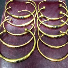 Add a touch of ethnic charm to your jewelry collection with these vintage handcrafted African Tuareg brass bracelets! Made in Nigeria, these cuffs embody the traditional craftsmanship of the Tuareg people. Perfect for any outfit, these bracelets are a must-have for any fashionista. #VintageJewelry #AfricanBracelets #EthnicJewelry #TuaregCraftsmanship #Handcrafted #BrassJewelry  🌍🔥👌  #Nigeria #Bracelet #Tuareg  #Ethnic #Cuff African Jewelry Traditional, Traditional Adjustable Fair Trade Jewelry, Handmade Adjustable Traditional Bangle, Traditional Handmade Adjustable Bangle, Traditional Handmade Black Cuff Bracelet, Traditional Fair Trade Bracelets For Festival, Handmade Traditional Bangle For Rituals, Traditional Handmade Bangle For Rituals, Traditional Black Bangle Jewelry