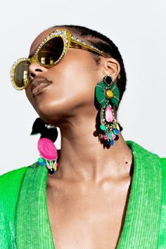 Our Jungle earring is colorful and modern. It is a staff favorite and an absolute glam girl piece. Tropical Fashion Shoot, Savage Lands, Festival Photoshoot, Taurus Aesthetic, African Aesthetic, Commercial Shoot, Beach Socks, Bday Shoot, Summer Shoot