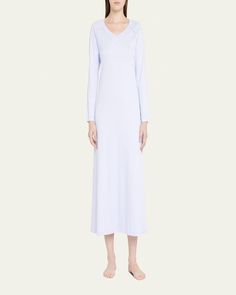 Hanro "Pure Essence" long nightgown with embellished seams    Approx. length: 51" from shoulder to hem    V neckline    Long raglan sleeves    Straight hem    Ankle length    Aline silhouette    Slipover style    Mercerized cotton interlock    Machine wash    Made in Hungary Spring Evening V-neck Nightgown, Elegant Maxi Length Sleepwear, Elegant Long Sleeve Nightgown For Loungewear, Full Length Spring Loungewear Dresses, Spring Full-length Loungewear Dresses, Elegant Maxi Length Sleepwear For Loungewear, Spring Full Length Loungewear Dresses, Spring Loungewear Full-length Dresses, Elegant Long Sleeve Spring Nightgown