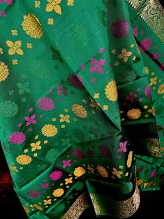 PLEASE NOTE - Width of dupatta is 32 inches and length is 92 inches. Gorgeous Green Color Banarasi Dupatta in Soft Silk Meenakari Chakras and black color tassles on the ends of the dupatta. Makes a Perfect Gift! Item: DupattaColor : GreenFabric : Banarasi Silk (Non-Pure Silk)Work : Meenakari Work with tassels Length of the dupatta : 32 inches (approx)Width of the dupatta : 92 inches (approx) Store Policies- No return or exchange will be accepted for color variations.- No return or exchange will Benarasi Dupatta, Men's Ethnic Wear, Bandhani Saree, Kantha Stitch, Silk Dupatta, Cotton Silk, Pure Silk, Gift Item, Cotton Linen