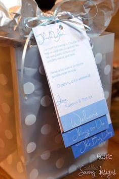 a blue and white polka dot gift bag