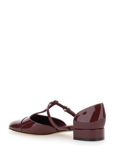 Ballet shoes Bordeaux Round toe T-strap with buckle Logo detail on the heel Leather Heel height: 2 cmComposition: Elegant T-strap Mary Janes With Buckle Closure, Formal Mary Jane Sandals With Low Heel, Evening Flat Heel Mary Janes With Heel Strap, Evening Mary Janes With Heel Strap And Flat Heel, Formal T-strap Mary Janes With Removable Insole, Formal T-strap Mary Janes With Buckle Closure, Formal Mary Jane Sandals With Buckle Closure, Elegant T-strap Mary Janes With Leather Sole, Elegant T-strap Mary Janes With Heel Strap