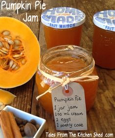 jars of pumpkin pie jam on a wooden table