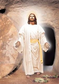 jesus standing in front of a cave with his arms outstretched