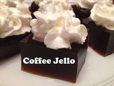 there are chocolate cupcakes with whipped cream on top and the words coffee jello