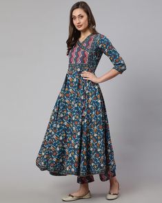 This chic set features a blue ethnic motif print angrakha shape anarkali kurta paired with matching trousers and dupatta offering a blend of elegance and contemporary style. The kurta boasts intricate floral print work that add charm and sophistication, while the trousers complement the ensemble with their coordinated design and printed dupatta. Perfect for both casual outings and special occasions, this set exudes effortless flair and cultural elegance in every detail. No of Sets - 3 Color - Blue Work Done - Ethnic Motif Print Detailing Kurta Fabric - Cotton Kurta Detailing - Angrakha Anarkali shape kurta, round neck with 3/4th Sleeves Trouser Fabric - Cotton Elasticated Waistband Slip on Closure Dupatta Fabric - Cotton Care - Machine Wash Model - 5"8 wearing size small Disclaimer : Sligh Angrakha Style Anarkali, Angrakha Anarkali, Angrakha Style, Printed Dupatta, Anarkali Kurta, Cotton Kurta, Anarkali Suit, Suit Set, Womens Size Chart