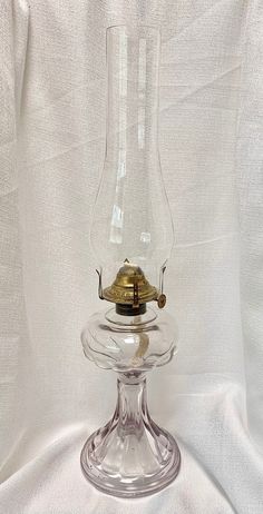 This is a very nice antique (c. 1909) United States Glass Company very pale SCA "late petal" (C. Thuro, Vol. 1, pg 318 reference guide) patterned stand/pedestal kerosene/oil/hurricane lamp in very good condition. The oil burner is a Banner burner and works very smoothly with a new wick included. The US Glass Co. was founded in Pittsburgh, Pennsylvania from 1891 to 1962. What is SCA purple? The glass was originally manufactured as a clear glass, but over time in a process creating sun colored ame Grape Kool Aid, Pittsburgh Pennsylvania, Oil Burner, Kerosene, Glass Company, Oil Burners, Aqua Color, Oil Lamps, Live Light