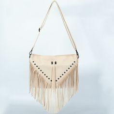 Women who like to stand out and show their original style will swoon for this enchanting Josette Fringe Crossbody Bag. Bold & luxuriously detailed, will perfectly compliment any outfit, whether it's your favorite skinny jeans or feminine floral dress.Specs: Main Material: PU Interior Slot Pocket Size: 32cm x24cm x3cm/ 12.59'' x 9.44'' x 1.18'' Chic Fashion Satchel, Chic Beige Fringe Shoulder Bag, Trendy Beige Shoulder Bag With Fringe, Chic Beige Fringe Bag, Chic Fringe Bags For Fall, Beige Fringe Shoulder Bag For Spring, Spring Beige Fringe Shoulder Bag, Spring Beige Shoulder Bag With Fringe, Chic Fringe Hobo Bag