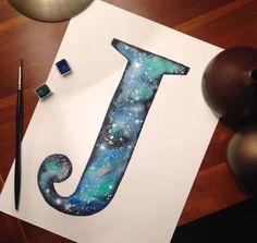 the letter j is made up of space and stars