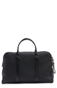 Smooth-leather straps highlight the natural grain of this spacious duffle bag perfect for weekend getaways or business travel. Two-way top-zip closure Top carry handles; removable, adjustable shoulder strap Interior zip pocket Structured silhouette with flat base and protective metal feet Leather Made in Italy Classic Black Textured Leather Duffle Bag, Black Textured Leather Travel Briefcase, Black Textured Leather Briefcase For Travel, Classic Weekender Bag With Leather Trim For Business Trips, Black Pebbled Leather Shoulder Bag For Travel, Textured Leather Top Handle Satchel For Travel, Business Satchel With Adjustable Strap In Pebbled Leather, Leather Handled Satchel Duffle Bag For Business Trips, Classic Textured Leather Weekender Bag For Business