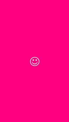 a pink wall with a smiley face drawn on it