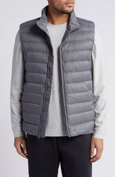 Whether you're deep in the backcountry or just your own backyard, you'll appreciate the cozy core warmth of this vest filled with 750-fill-power down. 26 1/2" length (size Medium) Front zip closure Stand collar Front zip pockets; interior chest zip pocket Durable water-repellent (DWR) finish Packs into pocket Lined, with 750-fill-power down 100% recycled polyamide Machine wash, tumble dry Imported Certified to the Responsible Down Standard (RDS) by Control Union Sleeveless Down Puffer Vest, Winter Hiking Vest Outerwear, Winter Hiking Outerwear Vest, Functional Midweight Winter Vest, Winter Down Sleeveless Vest, Winter Sleeveless Down Vest, Sleeveless Down Puffer Jacket, Nylon Outdoor Vest Outerwear, Outdoor Puffer Vest Jacket Sleeveless