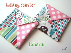 an origami christmas card holder made out of folded fabric with the words holiday coaster on it