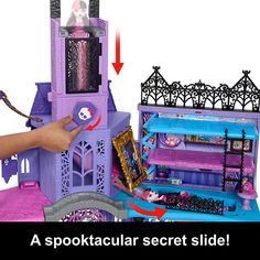 there is a doll house with furniture and accessories in the box, as well as a barbie doll